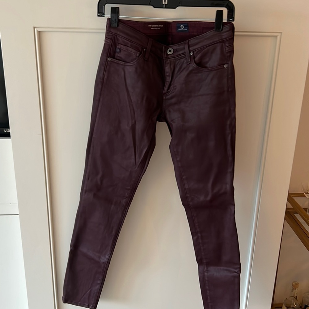 Gently worn burgundy coated (faux leather looking) legging from AG.